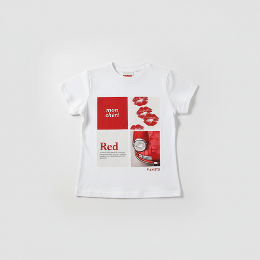 Woman wearing a white t-shirt with a red graphic design on a plain background